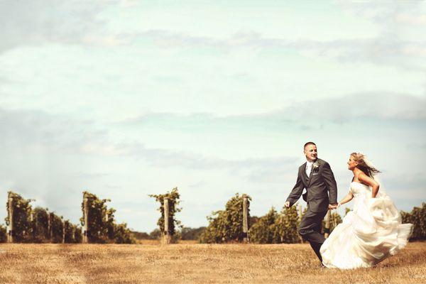 The enchanting beauty of our vineyard, where sprawling rows of vines create a mesmerizing backdrop for your special day.