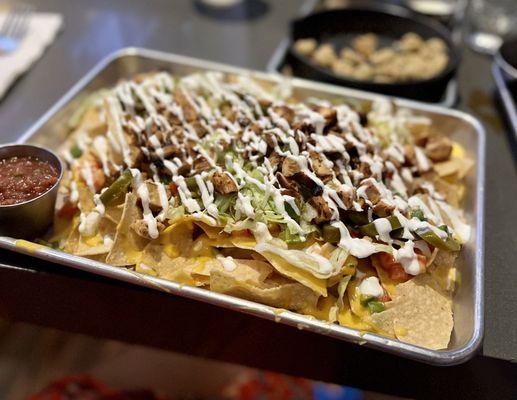 Loaded Chicken Nachos- $13. Super yum!