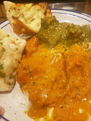 Chicken tikka maaala and saag paneer on basmati rice with garlic naan