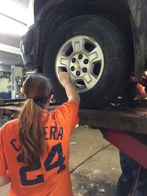 Alison learning how to change her oil and rotate her tires. She is our 16 now 17 year old daughter.