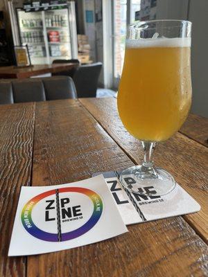 A hazy IPA and a sticker for the wall