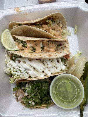 Shrimp Taco Fish Taco Supreme taco with carnitas on flour tortilla and Carnitas Taco regular