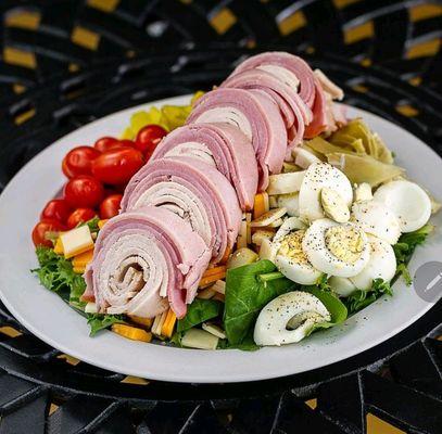 Chef's Salad.  Black Forest Ham, Oven Roasted Turkey, Hard Boiled Egg, Cheddar & Jack cheeses, Tomatoes, Romaine & Spring Mix Lettuce Blend