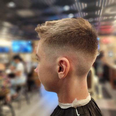 Skin fade by Barber Tim