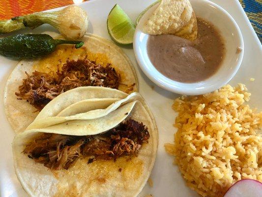 Shredded Pork Tacos, rice and refried bean dip for the fantastical chips.