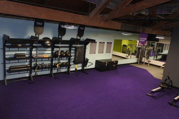 Large functional training area with TRX, Boxing, kettle bells, battle ropes, bands, and more. Try out our #1 Small Group Training program!