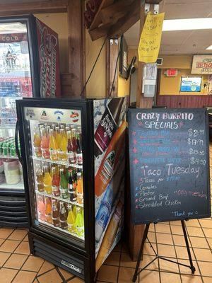 Interior and Specials. Juices and horchata are fresh in bottom of fridge.