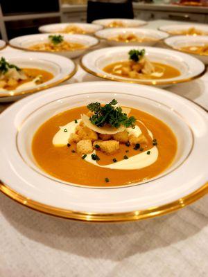 Girl Dug Farm "Kinder Nut Squash" Soup with House-Made Creme Fraiche, Shaved Parmesan Cheese, House-Made Croutons , Chives and Chervil