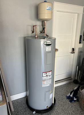 Happy Friday! Another day, another water heater swap out for us.  We love how this turned out!