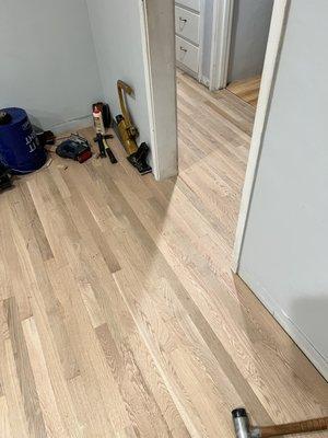 Installing White Oak Hardwood.