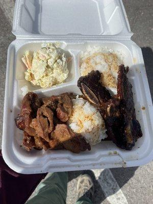 Kalbi Ribs; Char Sui Pork; Mac salad; Rice and soy sauce. These meats are only available on Fridays!