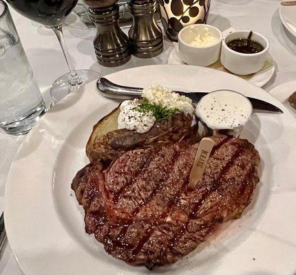 A perfectly prepared Rib-EyeSteak and delicious Bake Potato.