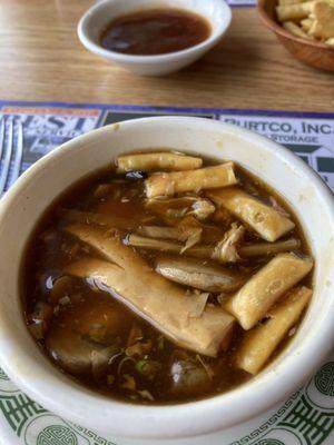 Hot and sour soup with crispy noodles.