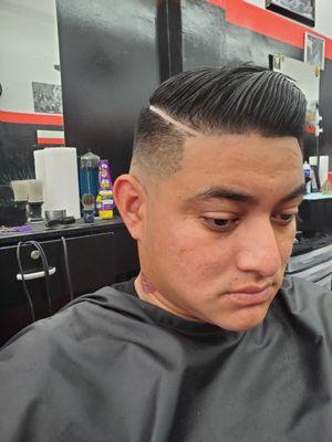 Mid fade w/ combover and hard part