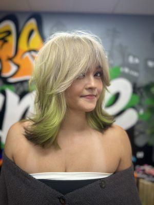 Green tipped hair and shag haircut by Evette