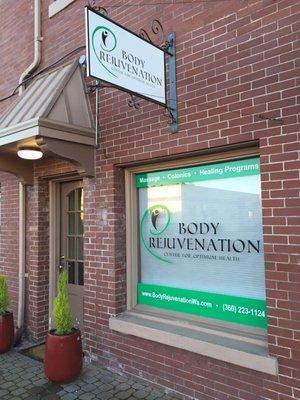 The entrance to Body Rejuvenation is in the Arts district of down town Bellingham. We are on the corner of Prospect and Flora.