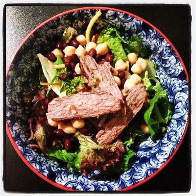 Tamarind marinated flank steak w/ Bibb lettuce & herbs salad.