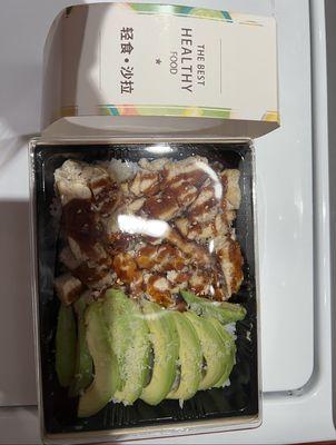 Teriyaki chicken with Avocado over sushi rice.