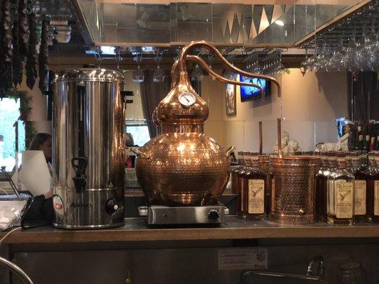 Some copper distilling device at the bar