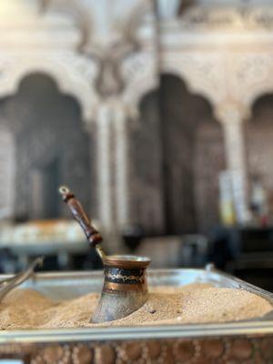 Coffee brewed on sand