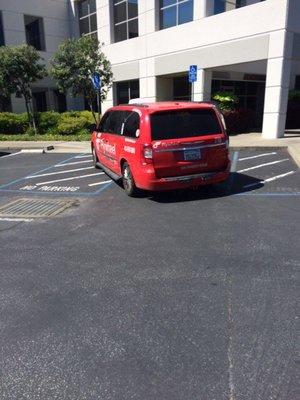 Literally a massive open parking lot behind, this car.  Driving like a maniac prior to this  *Note no handicap customer or driver*