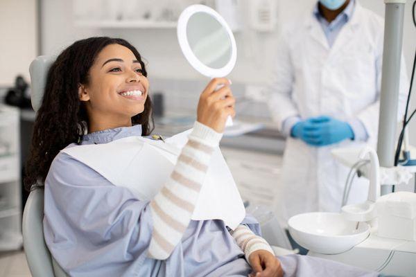 Happy Absolute Dental patient