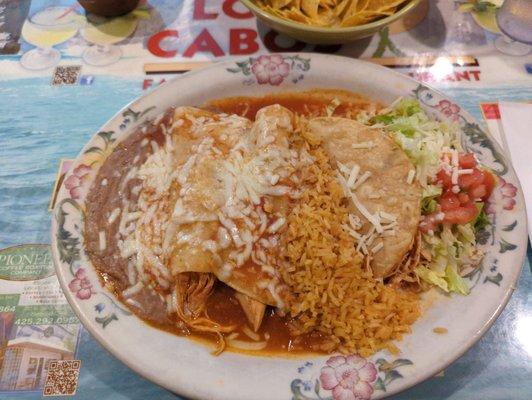 Combo #21 two enchiladas and a taco with rice and beans. All chicken.