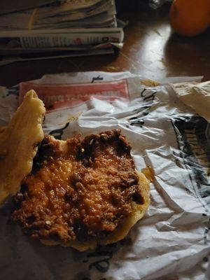 I order the new waffle chicken sandwich, as you can see the chicken is burned, chicken and waffle was DRY.