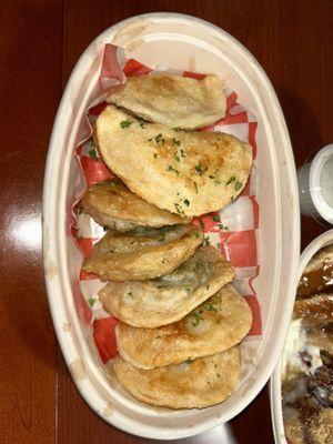 Half Spinach & 3 Cheese Pierogi and half of the garlic special pierogi