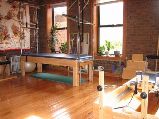 Come practice Pilates in a warm and beautiful setting on our custom Balanced Body equipment.