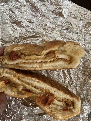 Tuscan Chicken, Sun Dried Tomato and Provolone Cheese Sandwich.