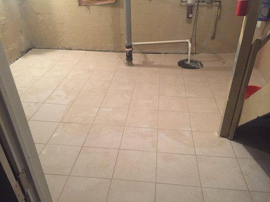 Basement floor tiled