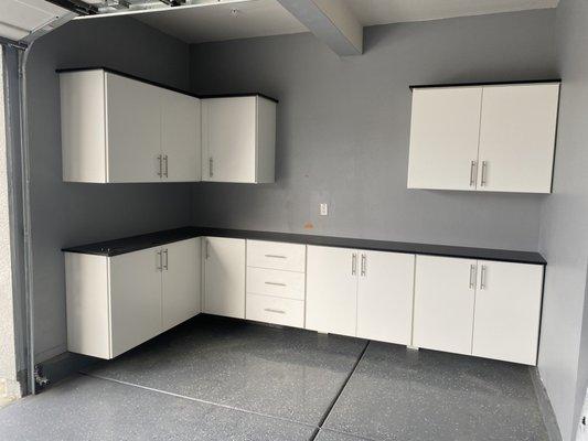 Garage cabinets with spacing to hang TV