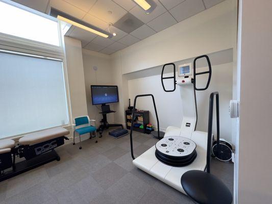 Neuro-rehab therapy room. Neuro-Modulation, Spine Decompression, Chiropractic Care.