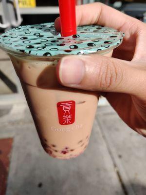 Strawberry milk tea with mango popping bubbles!