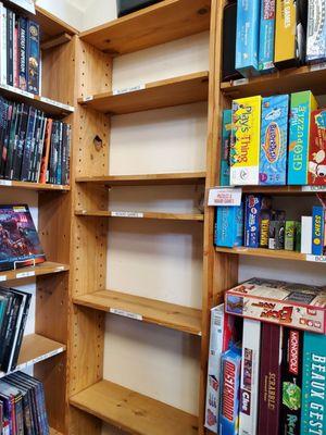 Empty used boardgame shelves. Hope more come in soon!