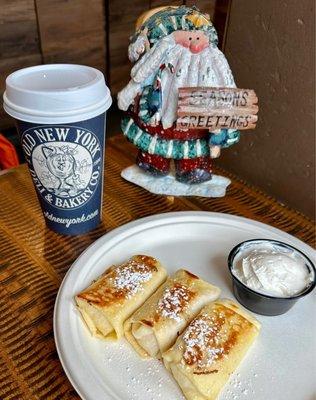 Blintzes stuffed with farmers cheese.