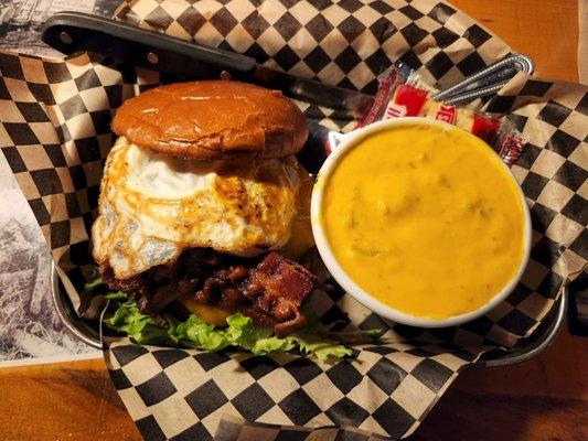 The bacon, egg and cheese burger with soup.