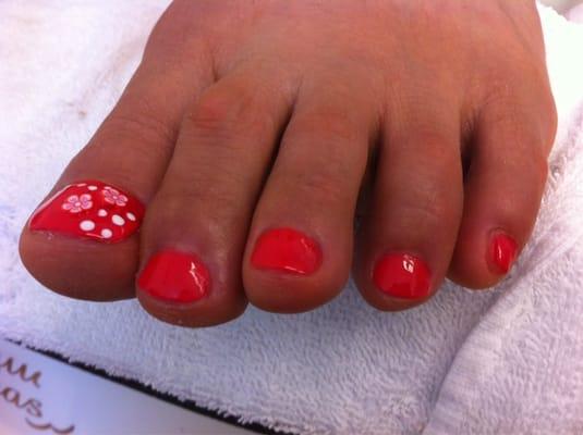 Pretty pedicure with floral design