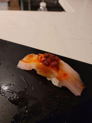 Must've missed this one in my notes, but it does appear to be yellowtail nigiri with some satay or chili crisps.