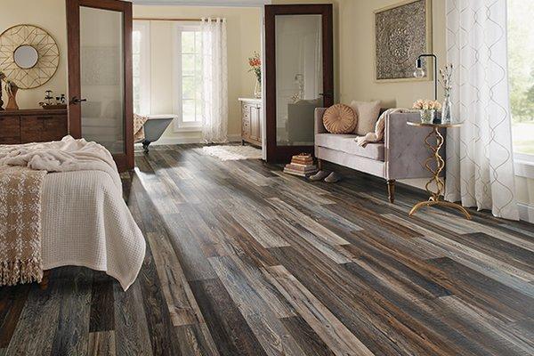 Is it real wood or a wood floor alternative that is waterproof? Your friends won't know the difference either.