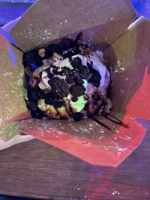 What the Fudge with ice cream, brownies, and chocolate sauce on a funnel cake