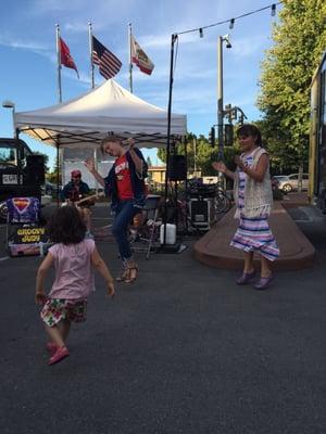 Children of all ages love to dance to the lovely soft music at Off The Grid Palo Alto