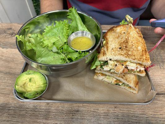 Chicken pesto sandwich and side salad