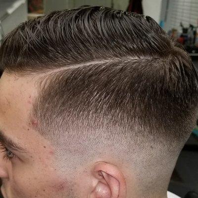 Mid skin fade w/hard part