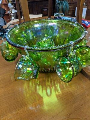 Look at this beautiful green carnival Punch bowl with 12 cups.