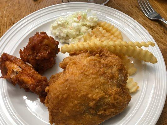 Buffalo wings, chicken, cole slaw and fries