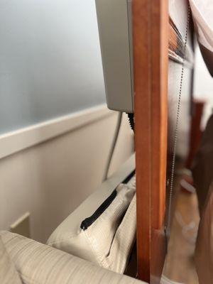 Dirty bed and  scratched headboard