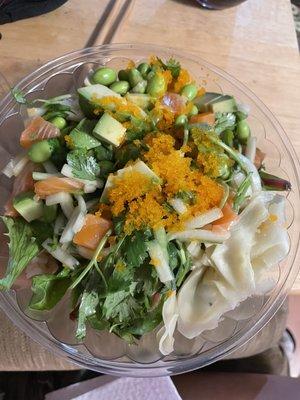 Half greens/half brown rice salmon poke bowls!  Very delicious!