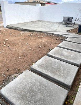 Concrete pavers and patio. Front, side, and back of house.